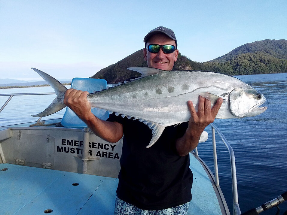 Angler with a Queenfish caught off Port Douglas