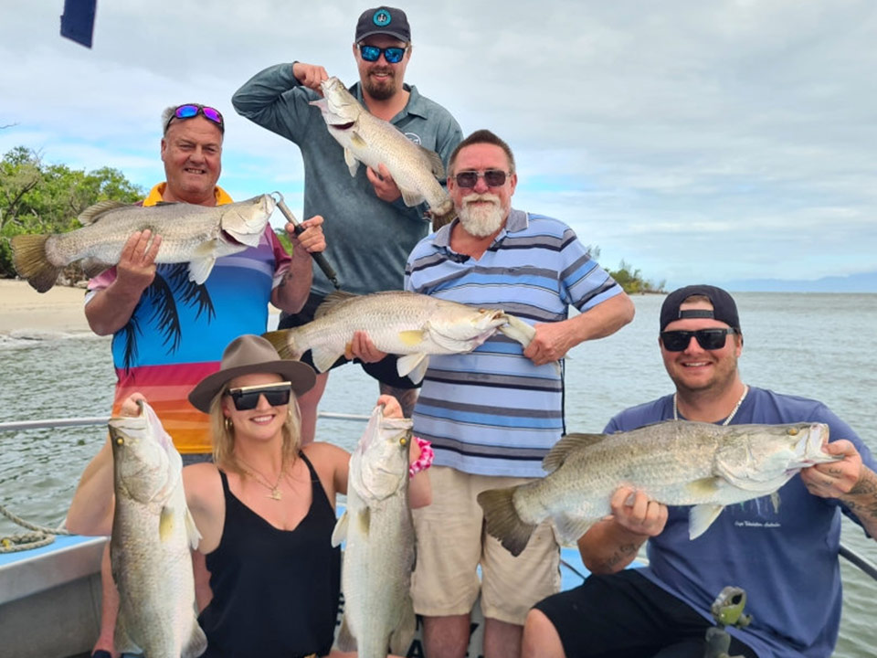 Group of anglers showing off their fish catch